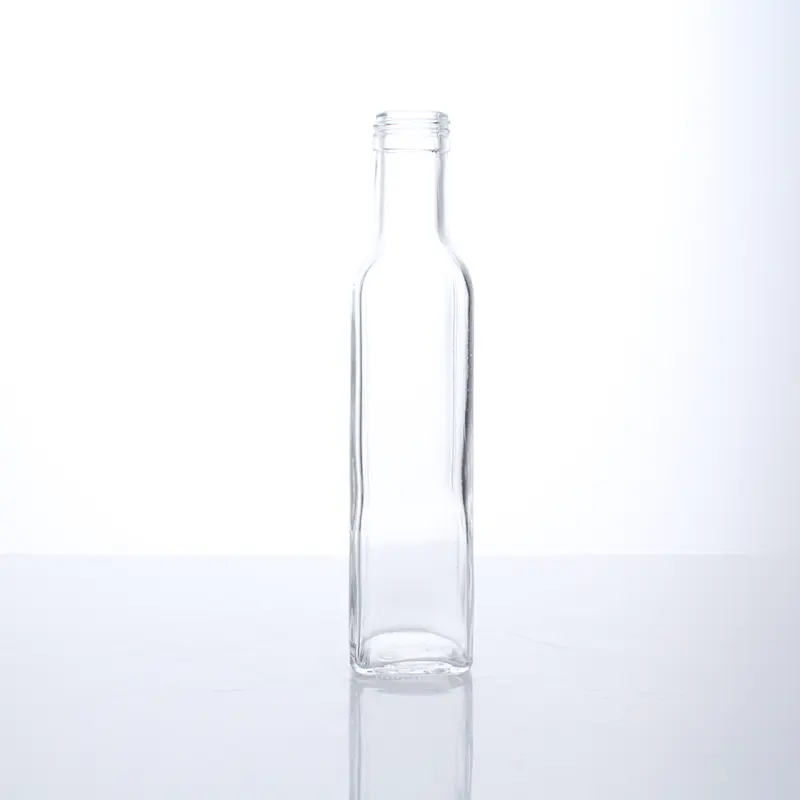 empty glass sauce bottles