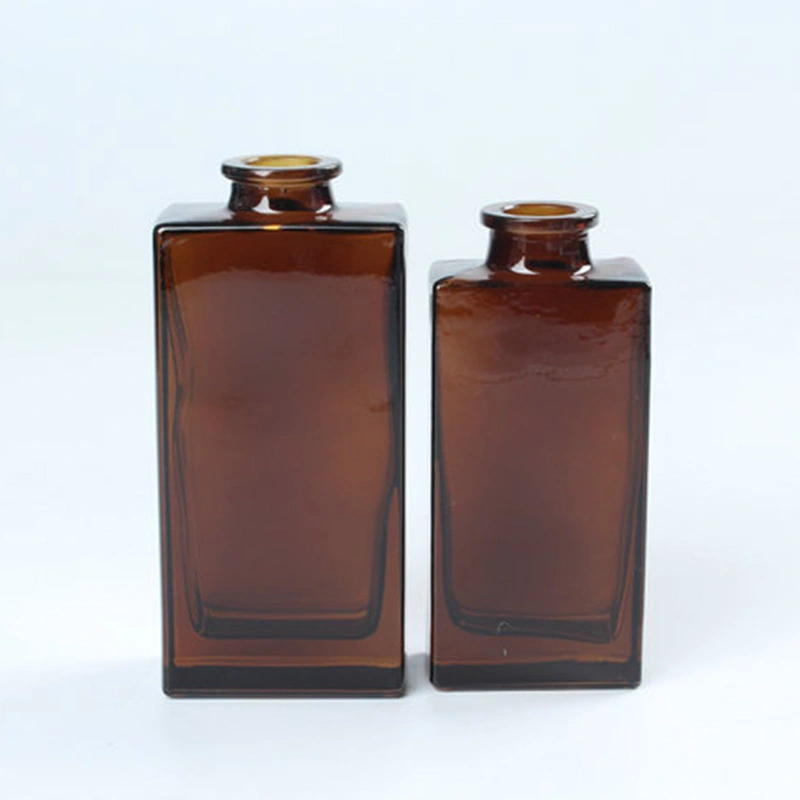 wholesale glass bottles with caps maker
